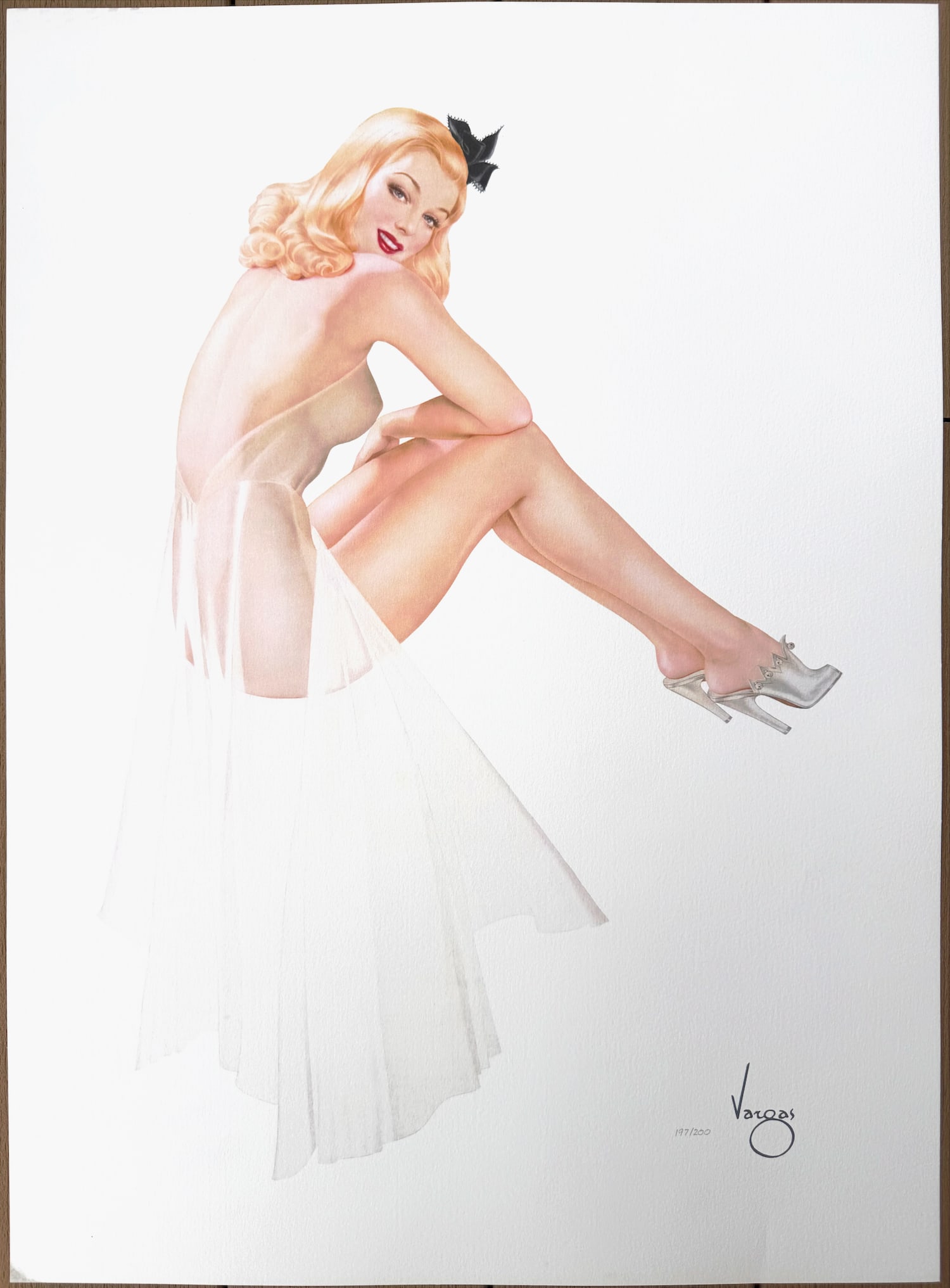 Alberto Vargas "Summer of '42" San Fransisco Art Exchange 197/200: This friendly Varga Girl must have been a welcome sight for those who turned to her image in 1942, almost one year after America entered World War II. Most likely painted in the spring or summer of 19