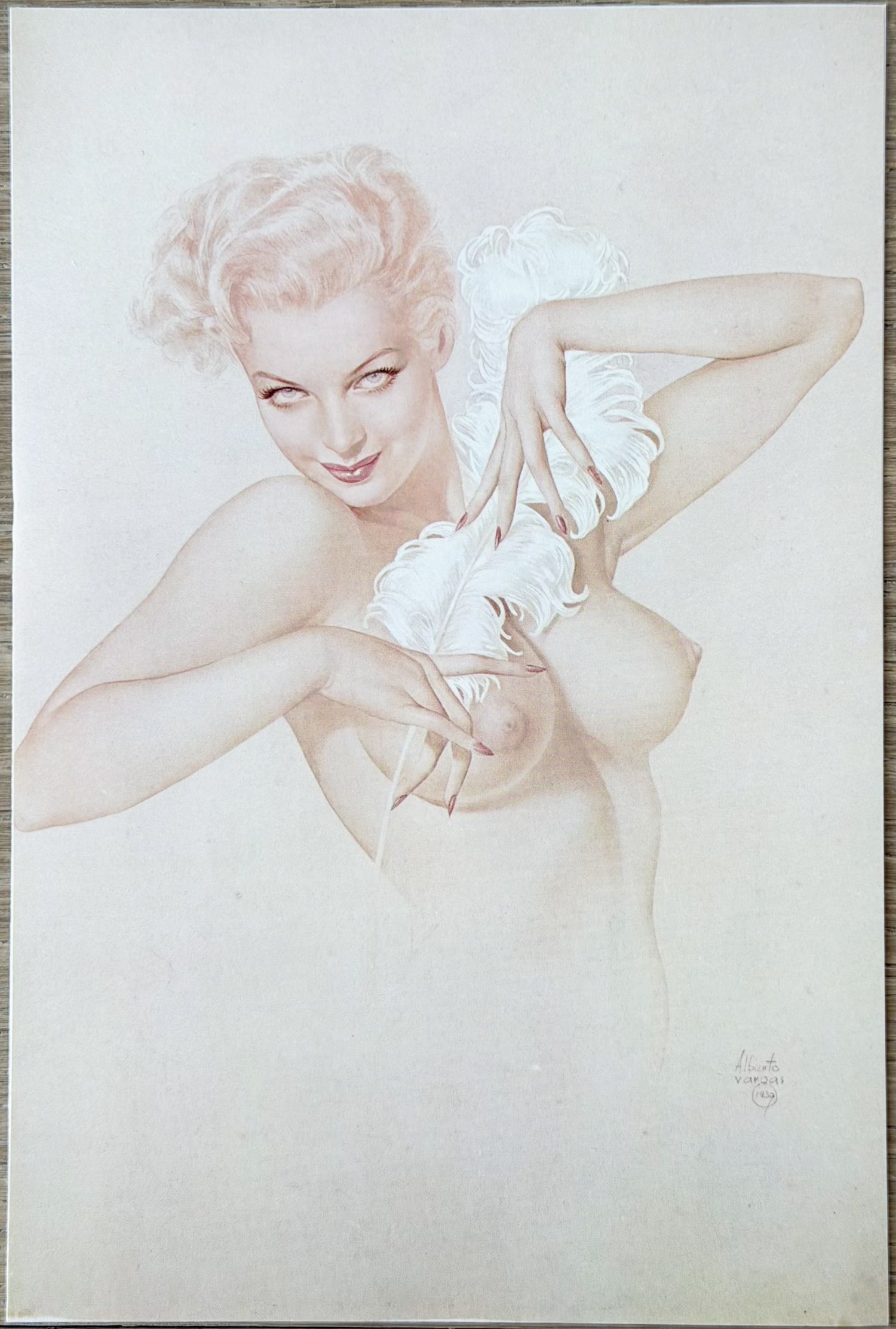 Alberto Vargas Pin-up “Blonde with Feather" 1979 Postcard: This 1979 Alberto Vargas postcard features a classic pin-up illustration of a beautiful, elegant blonde woman in a seductive pose. She gracefully holds a large white feather across her bare chest, gaz