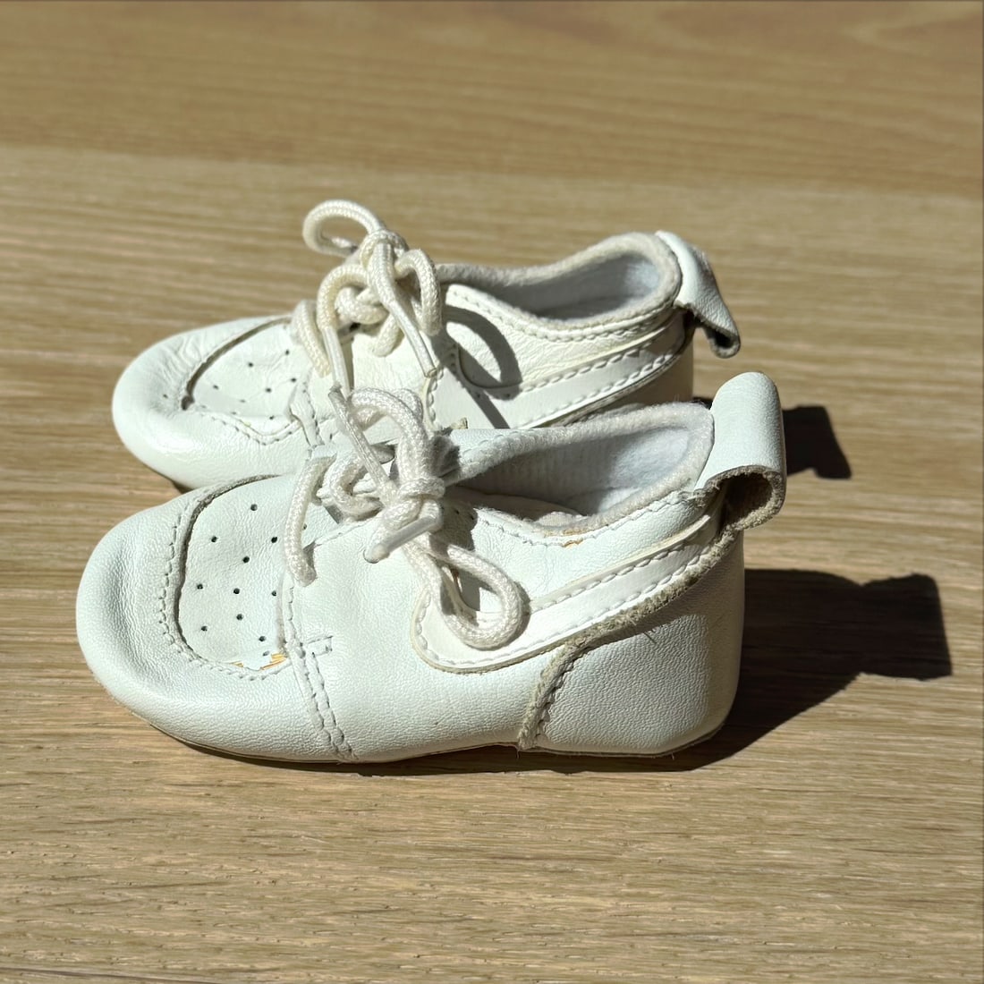 First Nike's Baby Shoes: These were released in 1993 and come with the receipt for $13.95 they're a historic piece of Nike and the shoe company.