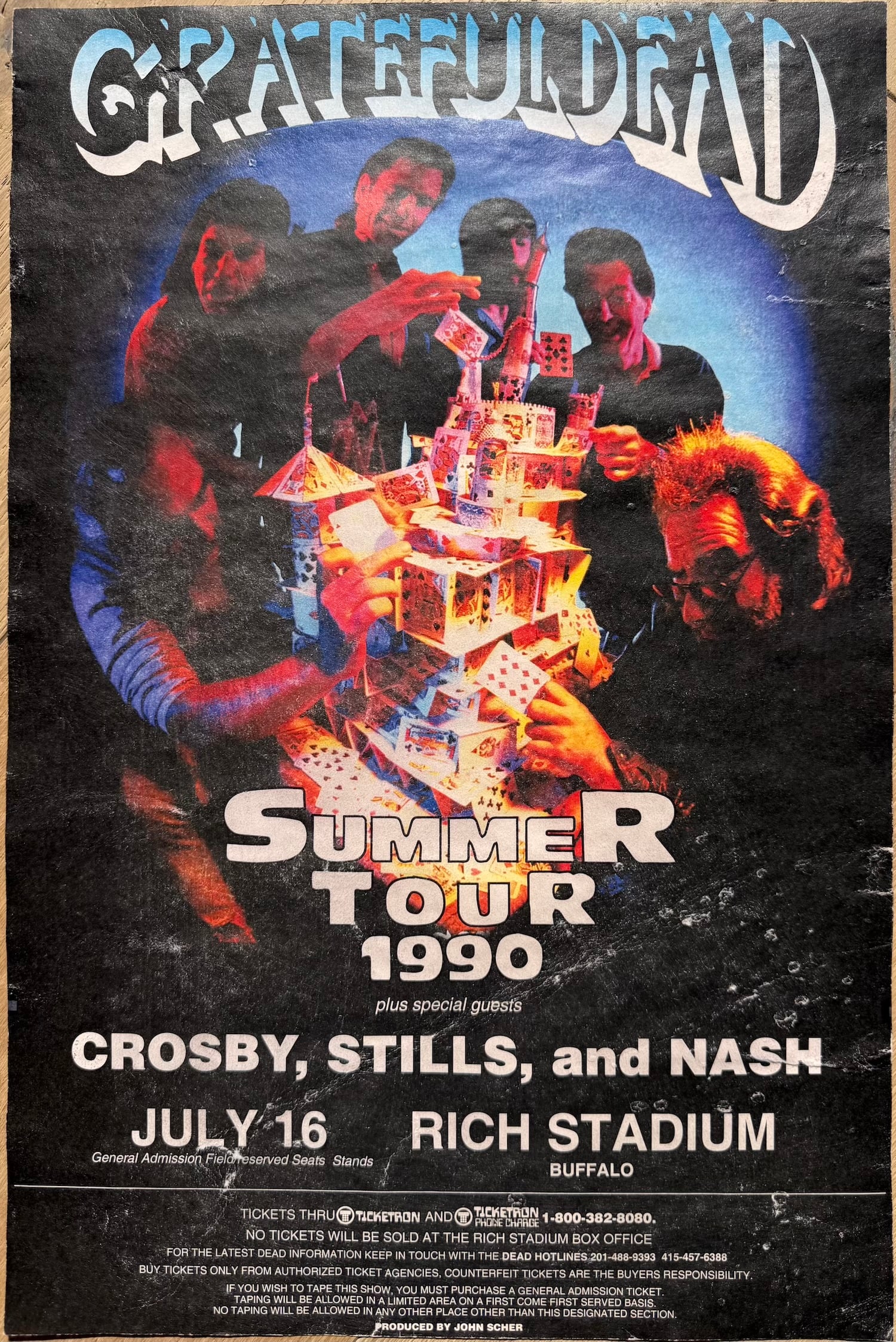 Grateful Dead Summer Tour 1990 Poster – July 16, Rich Stadium, Buffalo (w/ Crosby, Stills & Nash): Original promotional poster for the Grateful Dead’s Summer Tour 1990 performance at Rich Stadium in Buffalo, New York on July 16, 1990, with special guests Crosby, Stills and Nash.The striking centr