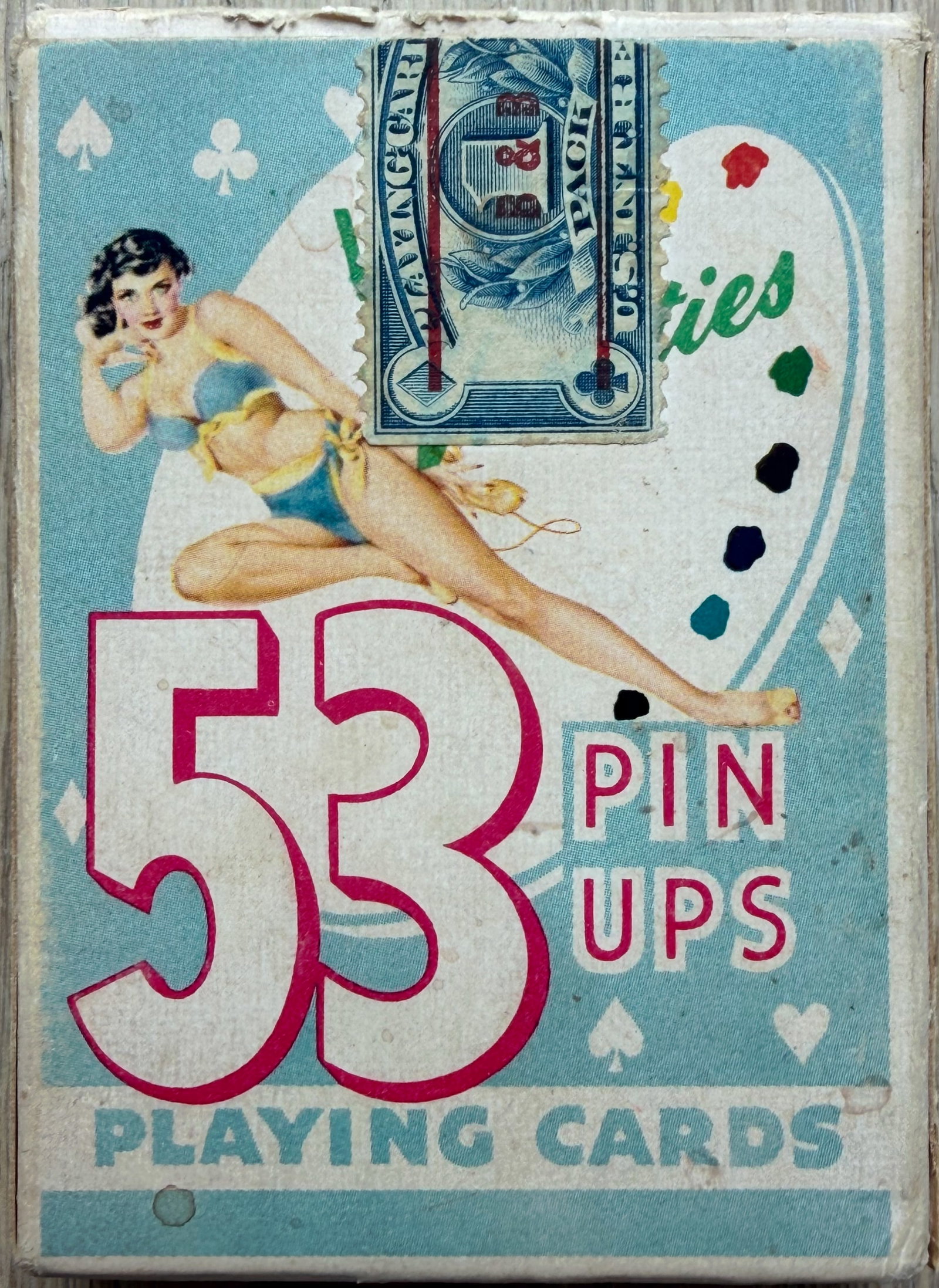 Alberto Vargas Vintage 1950s “53 Pin Ups” Playing Cards – Original Blue Box with Tax Stamp: Original 1950s Alberto Vargas “53 Pin Ups” (also known as “53 Vargas Girls” or “Vargas Vanities”) playing cards in the classic light blue box.This desirable deck features 53 di