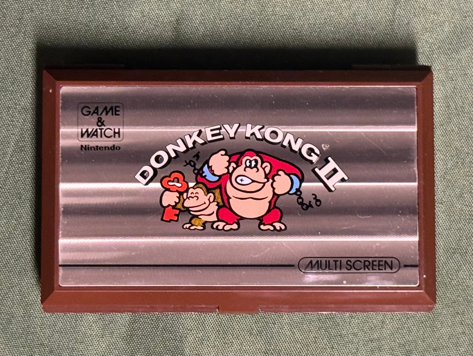 Nintendo Game & Watch - Donkey Kong II: 1983 release, tested and working condition. The Donkey Kong II model which was released on 7th March 1983 as part of the Vertical Multi Screen series. In this sequel to Donkey Kong, it is Donkey Kong 
