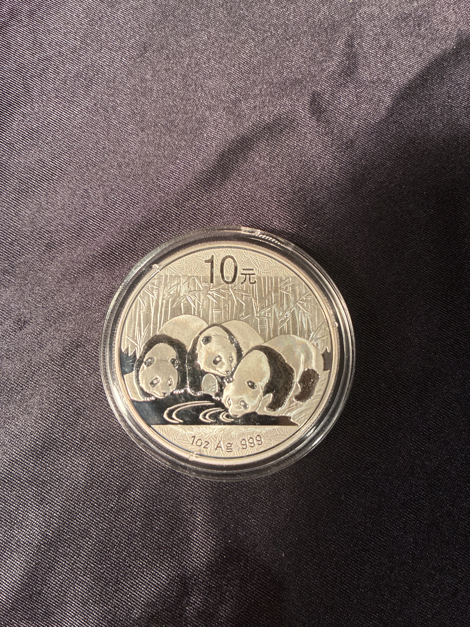 2013 Chinese Panda - Silver 1 ounce .999 fine: 2013 China 10 Yuan Silver Panda – 1 oz .999 Fine Silver Weight: 31.103 g Purity: .999 silver Pure silver: 31.07 g (1 troy ounce) Diameter: 40.00 mm Thickness: 2.98 mm We ship in-house worldwide — 