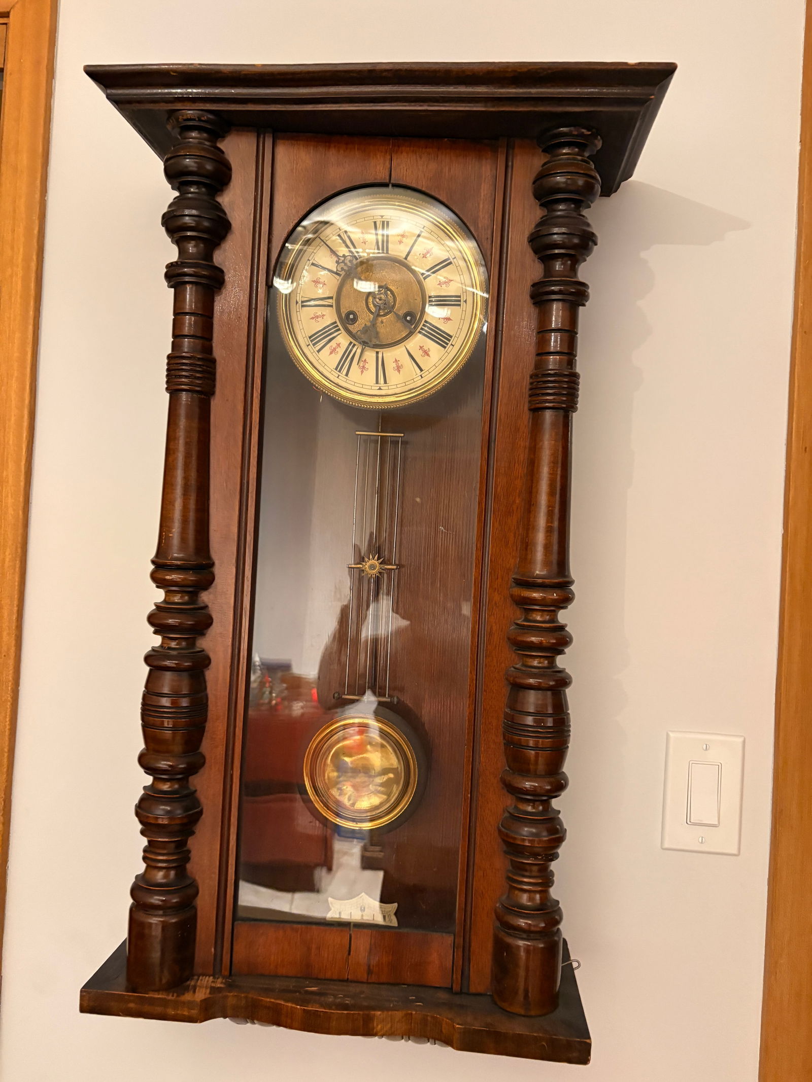 Antique German Wall Clock with Enamel Dial: Elegant antique German wall clock featuring an original enamel dial, richly carved wooden case, and classic pendulum movement. Keeps good time, easy to operate, and displays beautifully — a strong d
