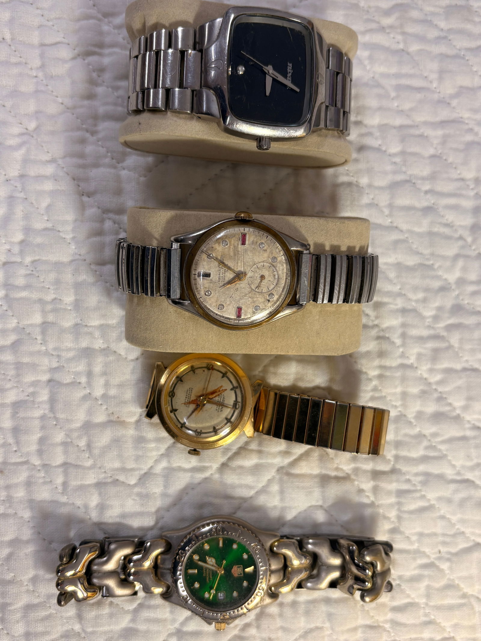 Group of 4 Men’s Wristwatches: Group of men’s wristwatches as shown. Watches are currently running at time of inspection; however, accuracy and long-term performance are not guaranteed. Visible wear, scratches, patina, and