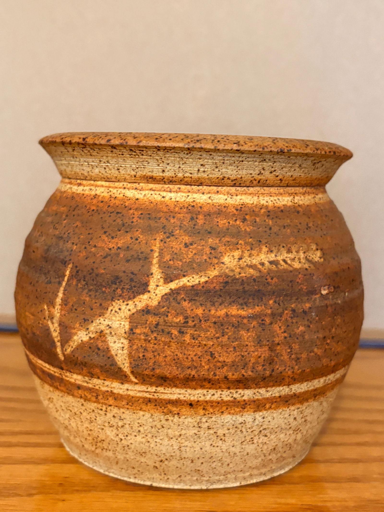 Vintage Pottery Stoneware Jar: Hand-thrown stoneware jar with earthy brown and cream glaze, abstract brush decoration, and visible wheel marks. Unmarked base, likely 20th-century studio pottery. Good decorative presence.