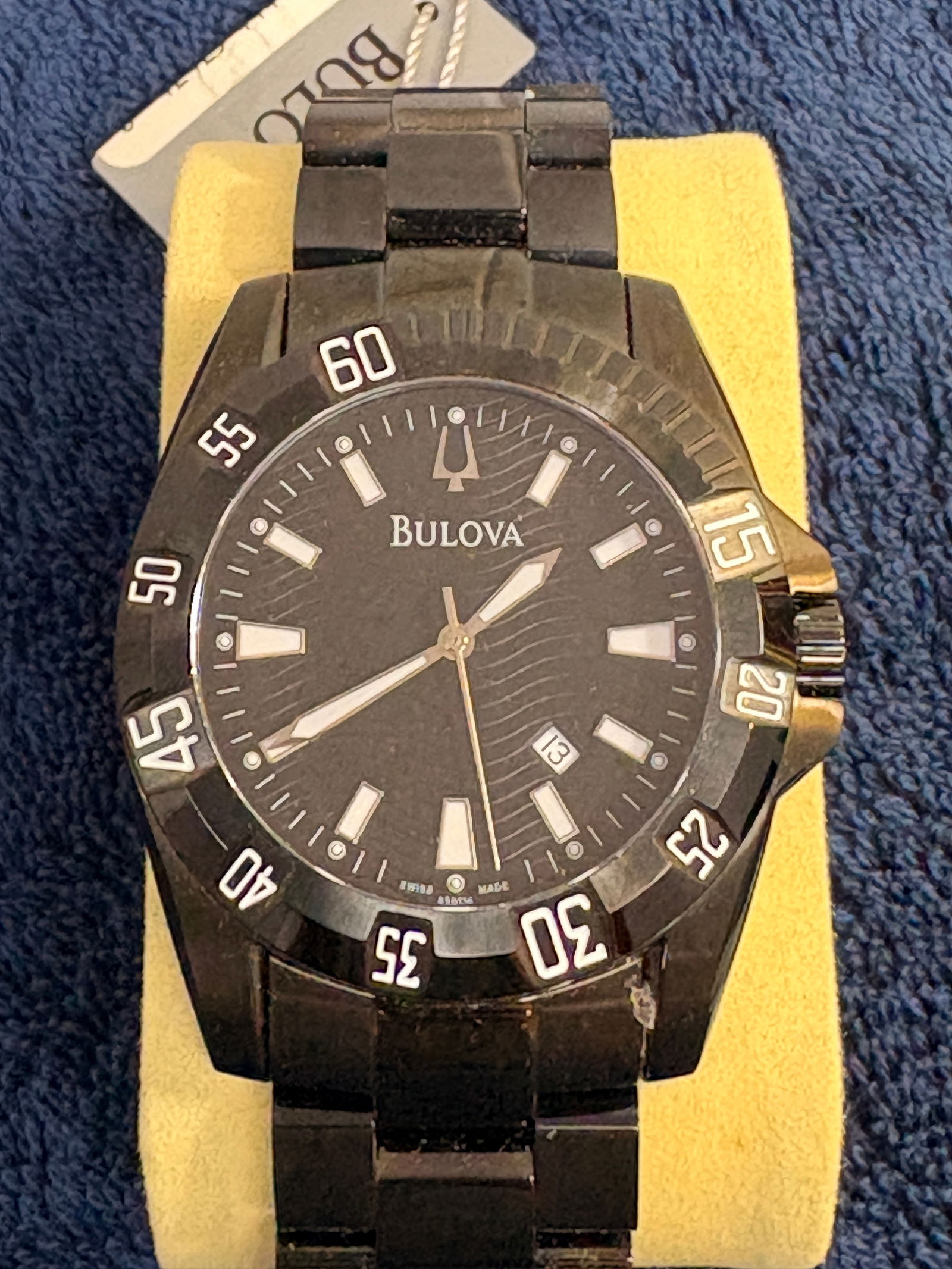 Bulova Black Ion-Plated Diver-Style Wristwatch (Ref. 65B114): Bulova men’s wristwatch featuring a black dial with luminous markers, date at 4:30, and black ion-plated unidirectional diver-style bezel. Matching black ion-plated stainless steel case and