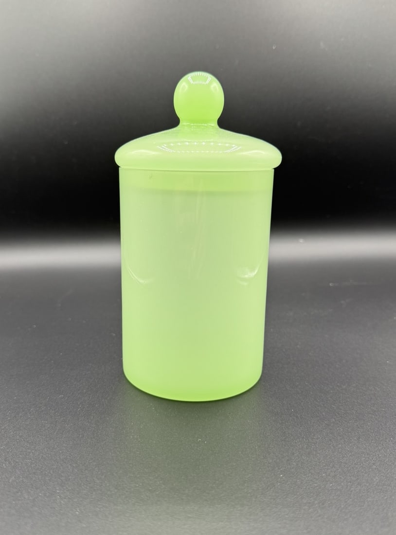 Vintage Jadeite-Style Green Glass Vanity Jar with Lid: Details: - Material: Opaque green glass - Style: Jadeite-inspired, satin finish - Approximate height (with lid): 7.5 inches - Approximate diameter: 3.5 inches - Condition: Excellent, with no chips, cr