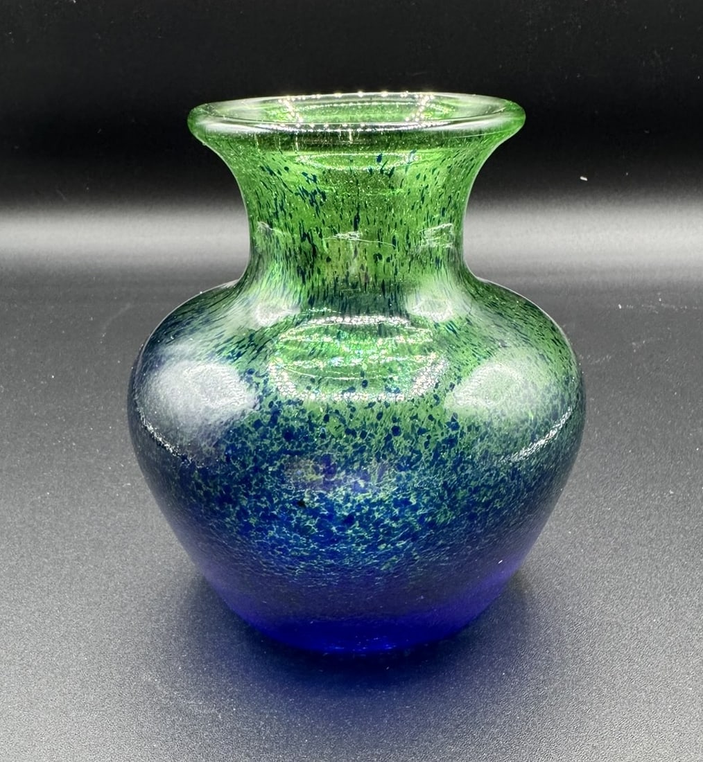 Vintage Reijmyre Swedish Art Glass Vase – Green & Cobalt Speckle: Offered is a stunning vintage art glass vase by Reijmyre Glasbruk of Sweden. This beautifully crafted piece features a bold speckled pattern in green fading into rich cobalt blue, a signature color tr