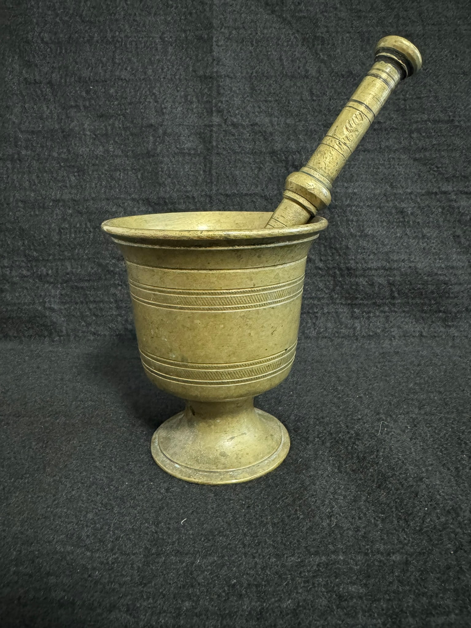 Antique European Cast Brass Mortar and Pestle – Attributed to Italy or Spain, Late 18th–: Antique European Cast Brass Mortar and Pestle – Attributed to Italy or Spain, Late 18th–Early 19th CenturyMaterial: Cast Brass Dimensions: Mortar 5" Tall x 4.5" Diameter Includes: Original Pestle 