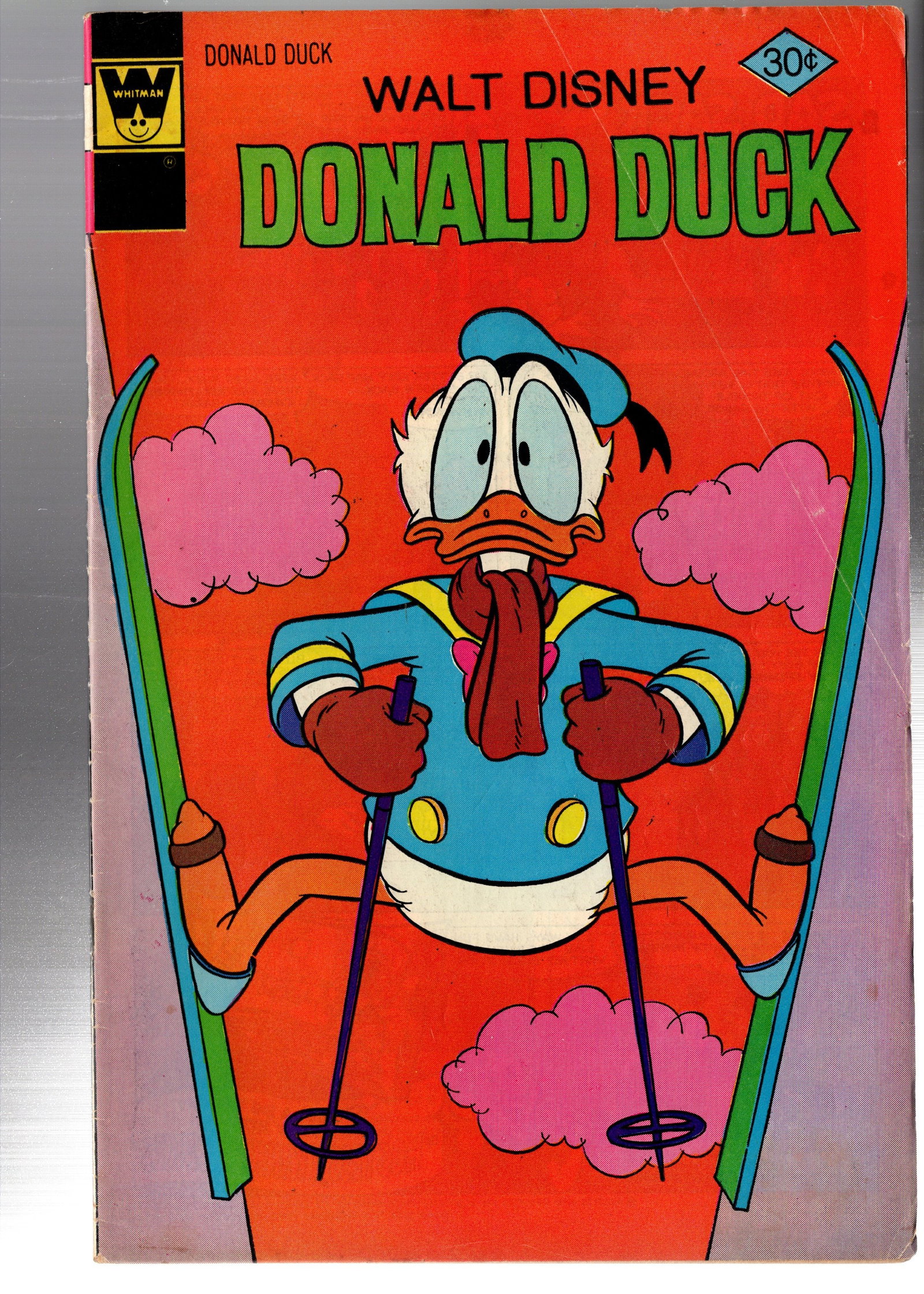 Donald Duck Whitman Edition: Walt Disney Donald Duck (Whitman Comics). Classic Bronze Age Disney humor comic featuring Donald Duck in a colorful skiing-themed cover. Bright Whitman-era artwork with strong nostalgic appeal for