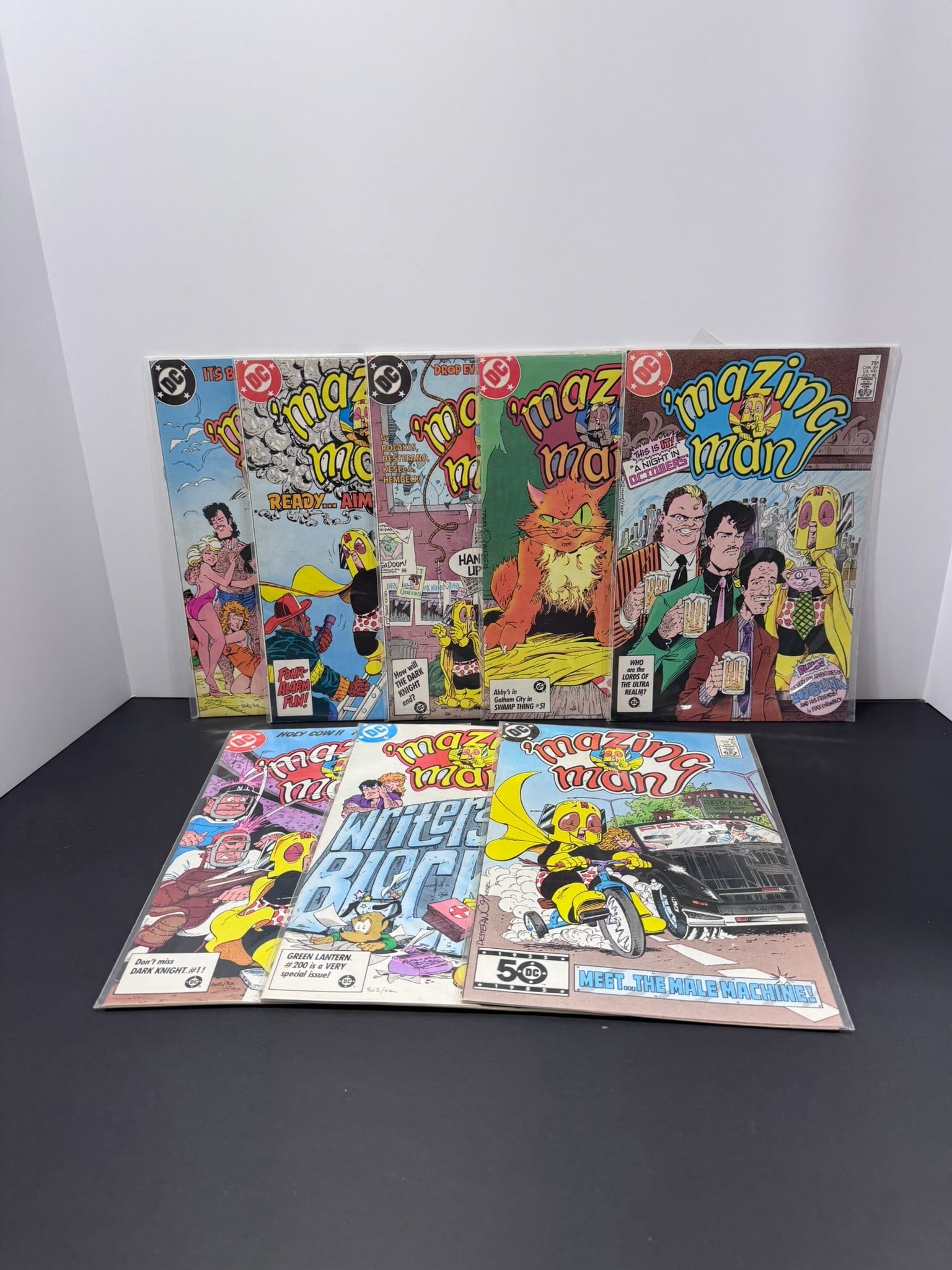 Amazing Man Comic Book Lot (8 Books) – DC Comics Bronze Age Series: Collection of eight issues of DC's Amazing Man series spanning the later issues of the run. Features colorful Bronze Age and Copper Age covers with a variety of stories and classic DC artwork. A solid