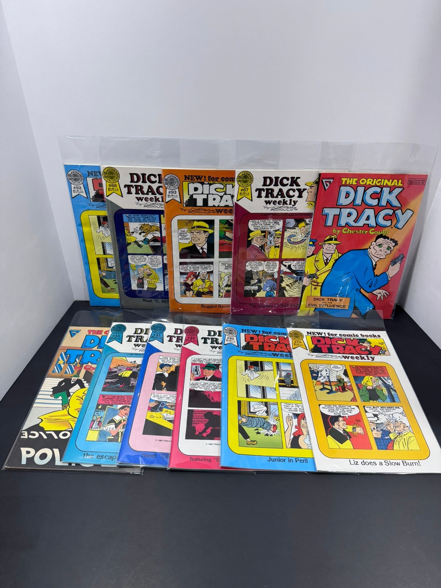 Dick Tracy Comic Lot – Gladstone & Dick Tracy Weekly (11 Comics): This lot features 11 Dick Tracy comic books published by Gladstone Comics and Dick Tracy Weekly, showcasing Chester Gould's legendary detective in a variety of modern reprints and serialized newspaper