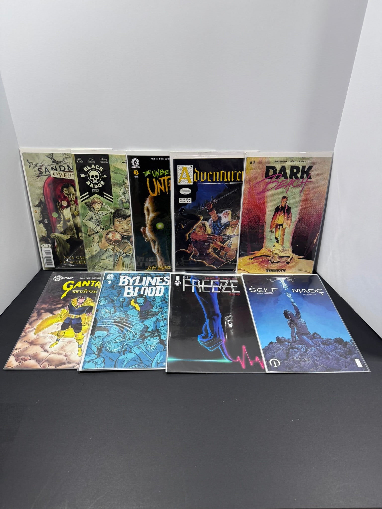 Independent & Creator-Owned Comic Book Lot (9 Books): Collection of nine independent and creator-owned comic books from Vertigo, Dark Horse, BOOM! Studios, Image, and other publishers. Highlights include The Sandman: Overture, Black Badge by Matt Kindt,