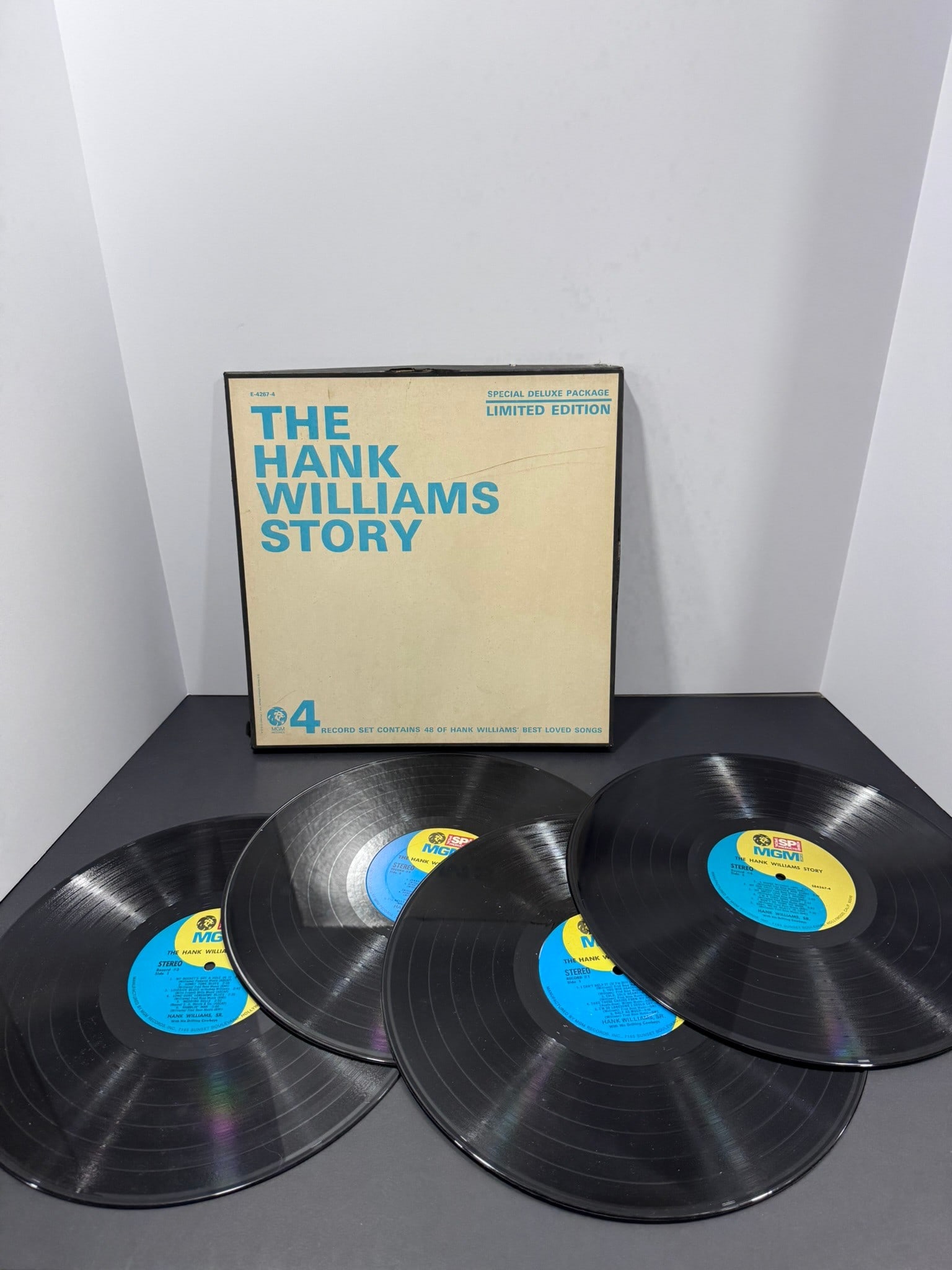 The Hank Williams Story (MGM Records) Limited Edition 4-LP Box Set: This The Hank Williams Story Limited Edition box set contains four vinyl LPs featuring 48 of Hank Williams' best-loved recordings. Issued by MGM Records as a deluxe collection, the set compiles many