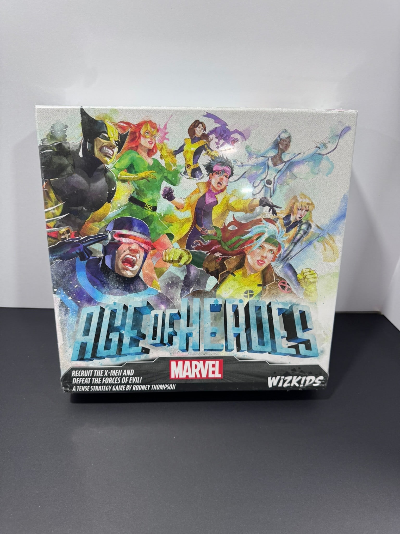 Marvel Age of Heroes Board Game (WizKids, 2023) Sealed: Recruit the X-Men and battle the forces of evil in Marvel Age of Heroes, a strategy board game designed by Rodney Thompson and published by WizKids. Players assemble teams of iconic Marvel heroes