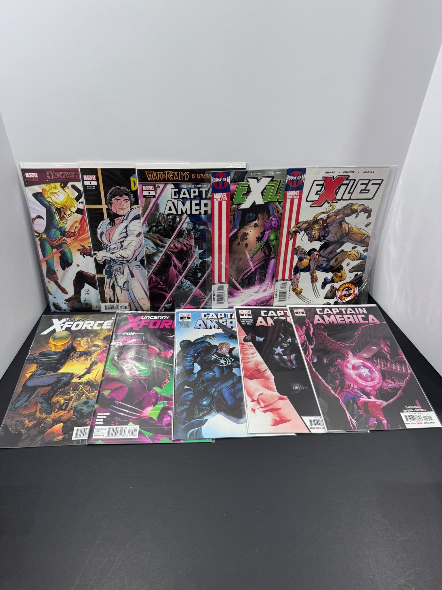Marvel Comic Book Mixed Lot (10 Books): Collection of ten Marvel comic books featuring modern and Copper Age titles centered around Captain America, the X-Men universe, and major crossover events. Highlights include Contest of Champions Ann