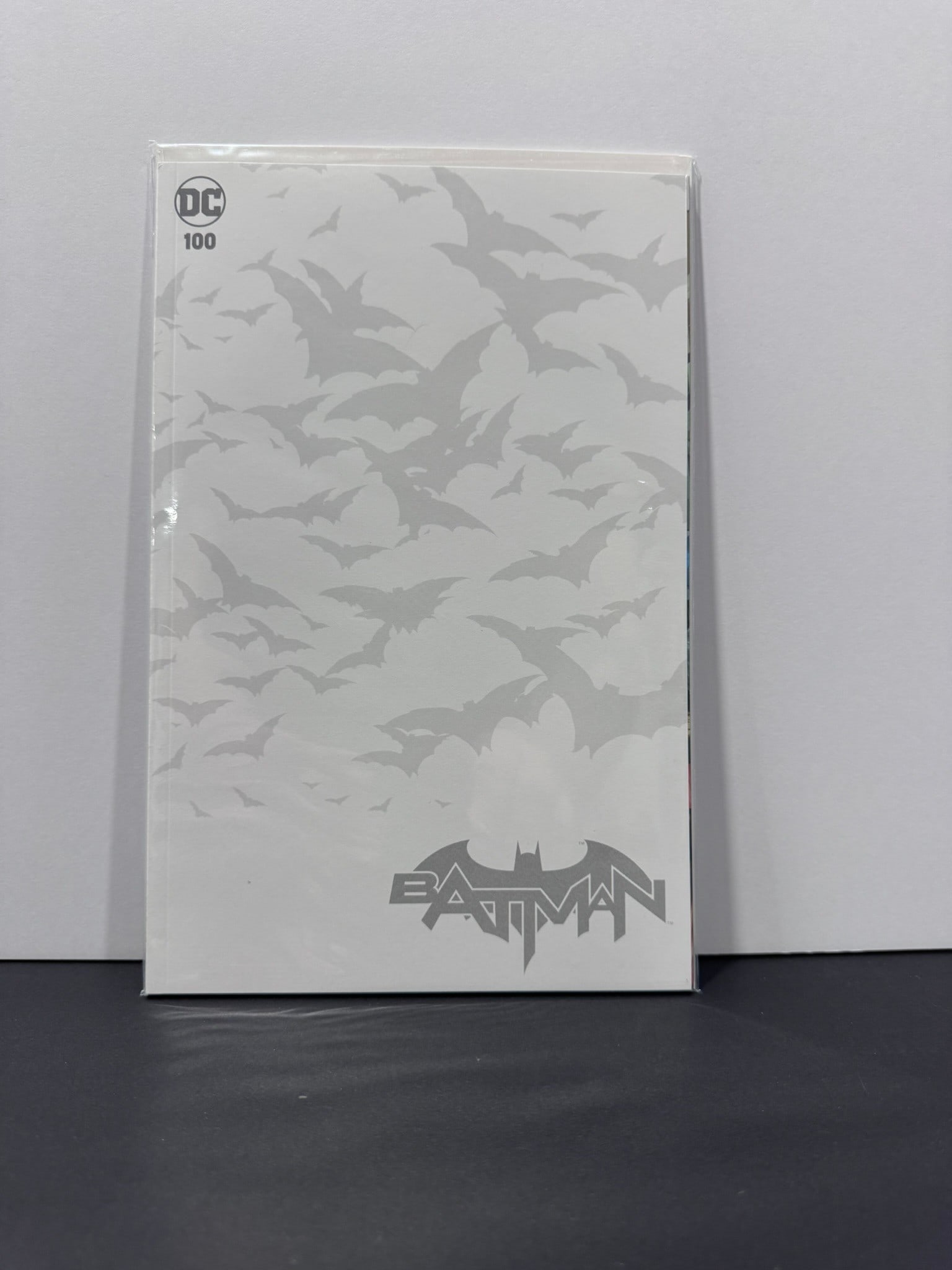 Batman #100 (DC, 2020) Blank Bat Pattern Variant Cover: Batman #100 is the milestone oversized conclusion to James Tynion IV's acclaimed "The Joker War" storyline and one of the defining modern Batman issues. This copy features the distinctive Blank Bat