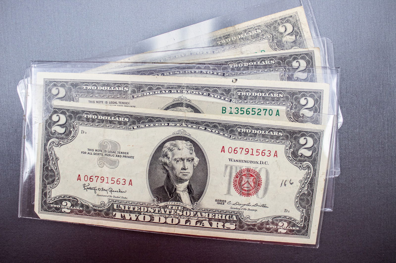 8-Bill Bundle - 1976 $2 bill (4), 1995 $2 bill (1), 2003 A $2 bill (2), 1963 Red Note Silver (1 of 11)