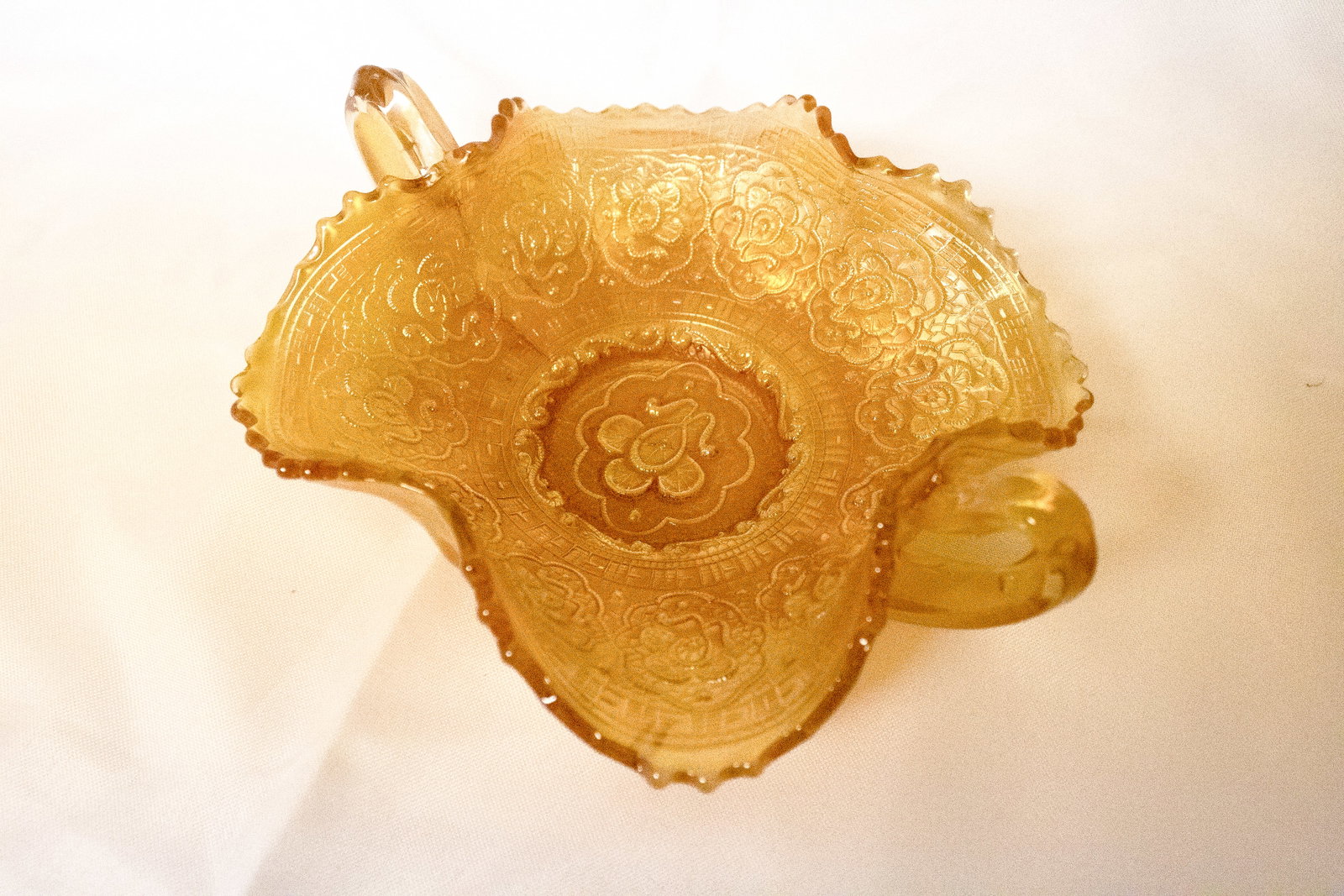 Fenton Marigold Carival Glass Persian Medallion Bon Bon Dish: A beautiful example of early 20th-century American glass artistry, this Fenton bon bon dish features the stunning "Persian Medallion" pattern in rich marigold carnival glass. The iridescent finish ref