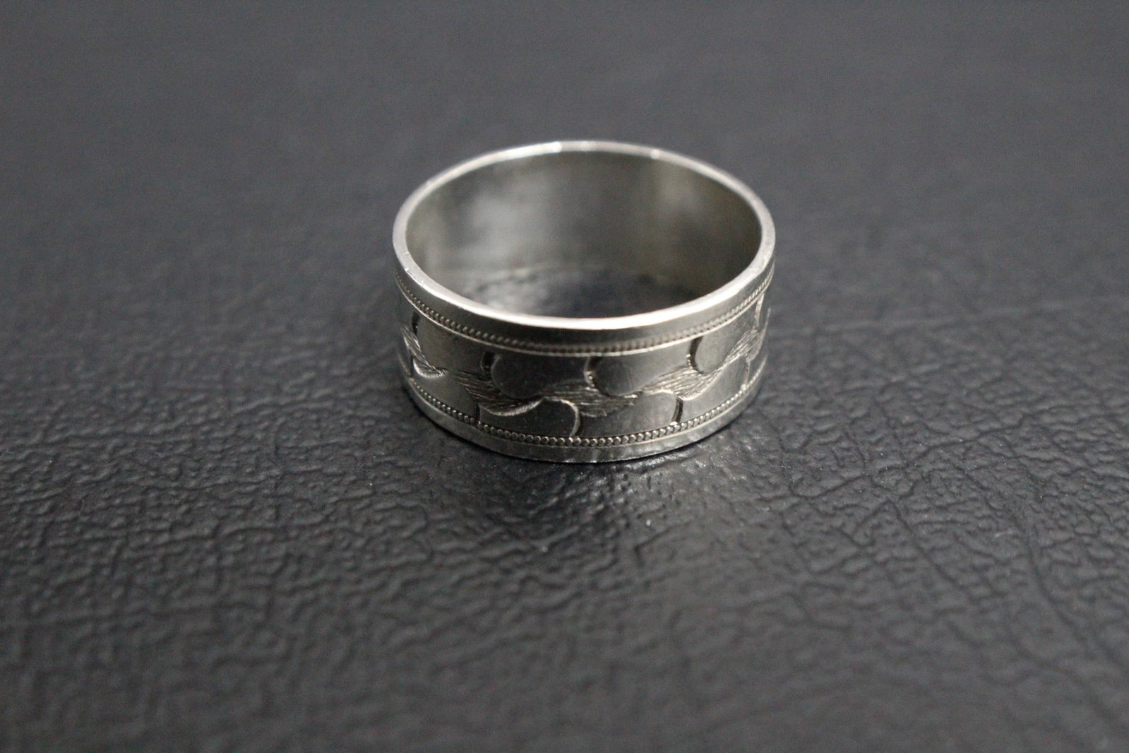 Sterling Silver Band with Etched Design: Timeless and versatile, this Sterling Silver Band features a beautifully etched design that adds subtle texture and visual interest. Perfect as a minimalist statement ring, a stackable piece, or even 