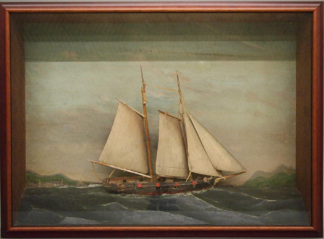 19th c. ship diorama: A late 19th century carved and painted ship diorama. Full model of a two-masted brig sloop at sea, featuring four sailors on deck, possibly in British Napoleonic era uniform, and three canons, the bac