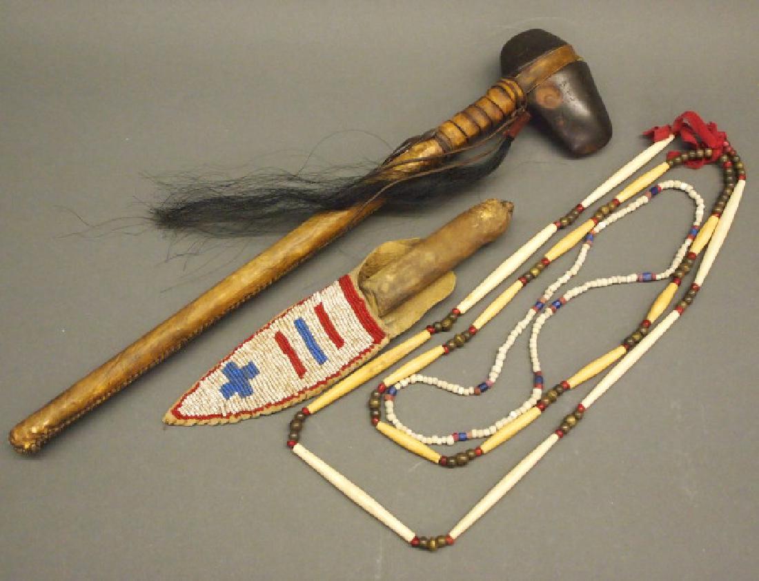 4 Native American Indian items: Four Native American Items. Including 1 Sioux bone "hair pipe", brass and glass bead necklace, double strand, late 19th-early 20th century, and 1 other bead necklace, most beads are glass, others are