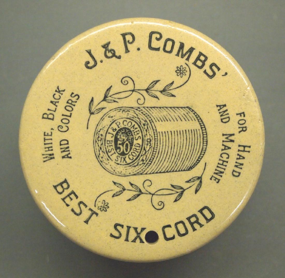 Stoneware advertising string holder: A late 19th century stoneware advertising string holder. Transfer decoration reads "J. & P. Combs' Best Six Cord, White, Black and Colors, For Hand and Machine." A minor nick at the edge, under the gl