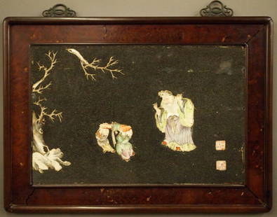 Pr Chinese porcelain plaques: Two turn of the century Chinese porcelain plaques. Each inset with hand painted porcelain figures on Black stucco with two signature seals within molded wooden frames. Numerous small chips, cracks, an