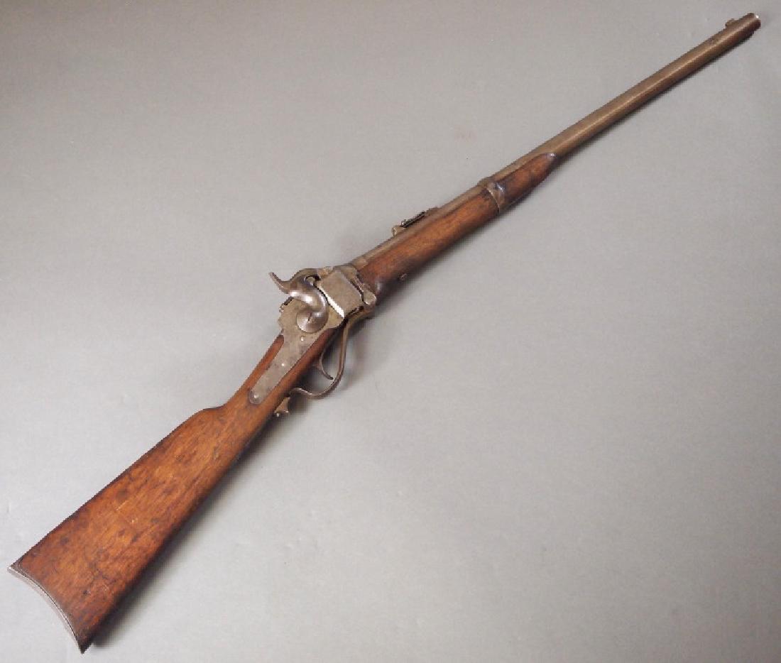 Sharp's New Model 1863 Carbine: A Sharp's New Model 1863 Carbine. 50-70 caliber, with a sling bar affixed to the left side, without a patchbox. Stamped "SHARPS RIFLE, MANUFG. CO. HARTFORD, CONN./NEW MODEL 1863" along the smooth barr