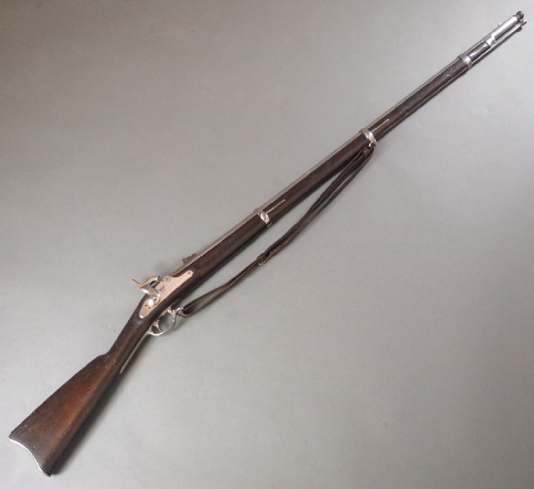 U. S. Springfield Model 1863 rifle: A U. S. Springfield Model 1863 rifle. 58 caliber, single shot muzzleloader, with sling swivels, leather strap, and ramrod. Stamped "U.S./SPRINGFIELD" with an eagle and "1864" on the lock plate, "VP" p