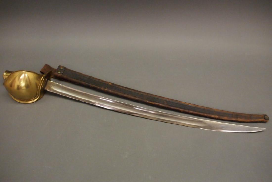 Ames Model 1860 Naval Cutlass: An Ames Model 1860 U. S. Naval Boarding Cutlass. Rounded sheet brass hilt guard, leather grip, and scabbard. The reverse ricasso is stamped "Made by/AMES MFG. CO./CHICOPEE/MASS.", and "P/JRG/1862" bel