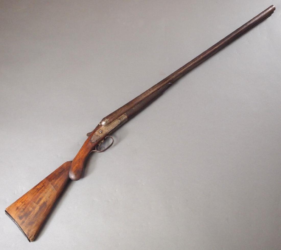 19th c Belgium SxS Shotgun: A 19th century Belgian Double-Barrel shotgun. 12 gauge, with side-by-side barrels. Stamped "BELGIUM/LAMINATED STEEL" on the top rib, and "BELGIUM/NEWMAN BROS." on the lockplate. No serial number. Crac