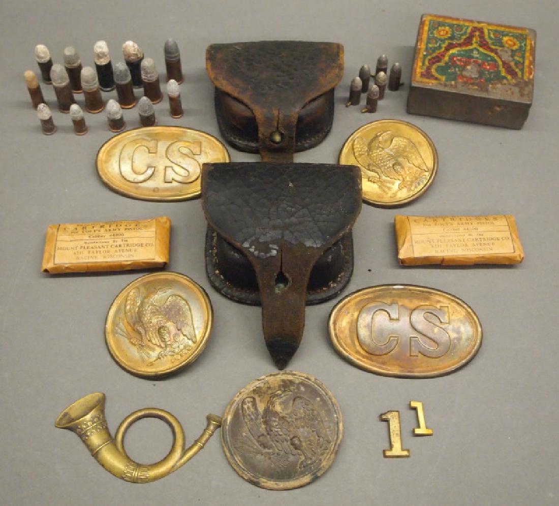 Civil War era cap boxes and accessories: A group of Civil War era and replica accessories. Including 1 leather Union cap box; 1 leather cap box embossed "C. S. STORMS, MAKER NY"; 1 original cartridge box badge and 4 reproduction cartridge bo
