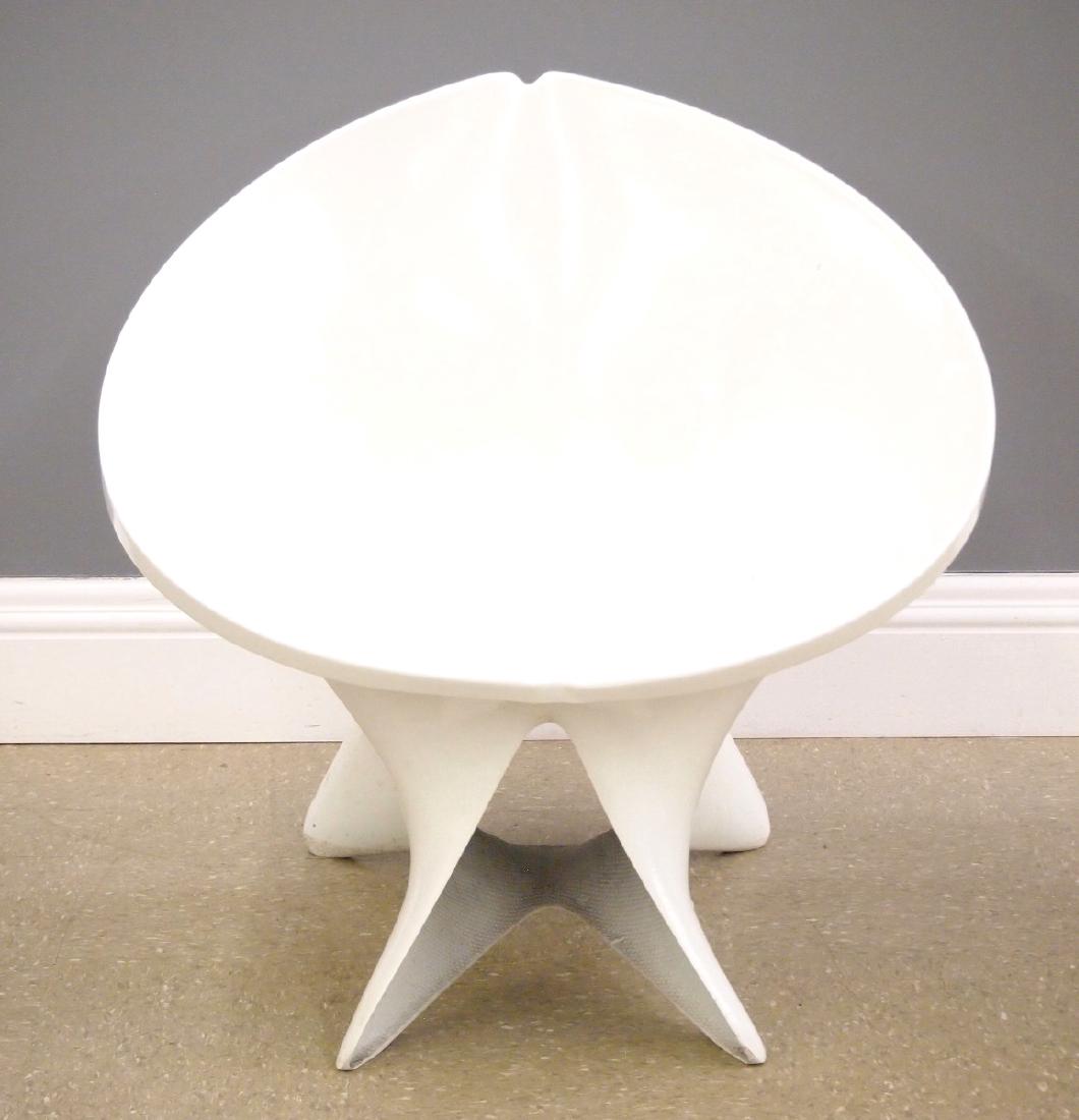 Fiberglass lounge chair: A contemporary fiberglass "handkerchief" form side chair. White, molded fiberglass construction. Some surface wear. 30" high. ESTIMATE $200-300