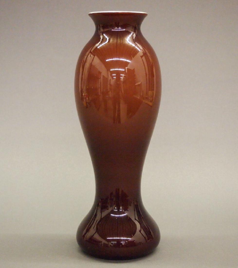 Imperial Lead Lustre vase: An Imperial Lead Lustre glass vase. Inverted baluster form, glossy brown exterior and iridescent orange interior. Light wear; overall, good condition. 10 3/4" high. ESTIMATE $200-300