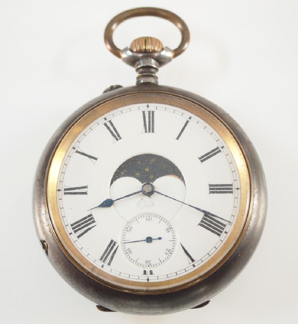 Swiss triple calendar moon phase pocket watch: A Swiss moon phase pocket watch with triple calendar cuvette. 53 mm, 15 j bridge movement, SW, Pin set, Gun Metal, glazed back, OF, SSD Moon phase dial with Roman numerals. Some case wear, damage at d