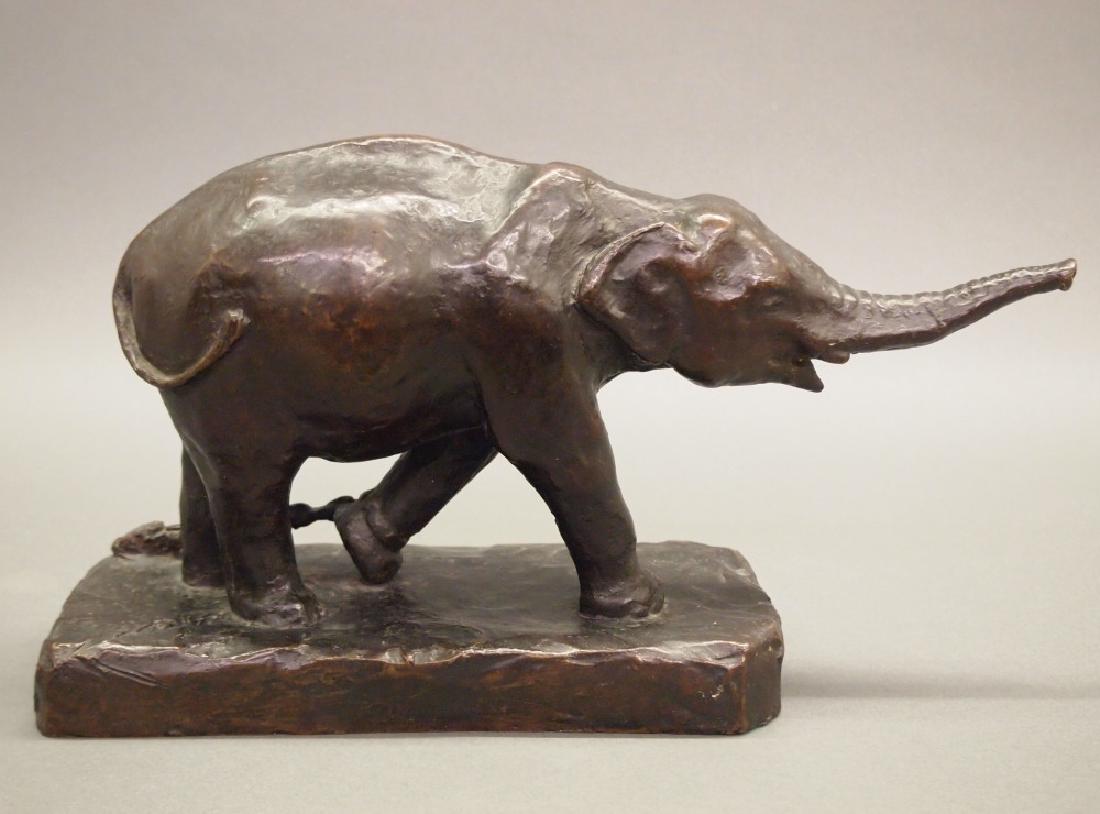 K.O. Deming Bronze: K.O. Deming, n.d.. Bronze sculpture depicts a chained elephant, with an upraised trunk. Marked on the base "Ro Jo K.O. Deming No.1" along with "Amer. Art Fndy N.Y.". Minor wear. 11 3/4" x 6 1/2" high.