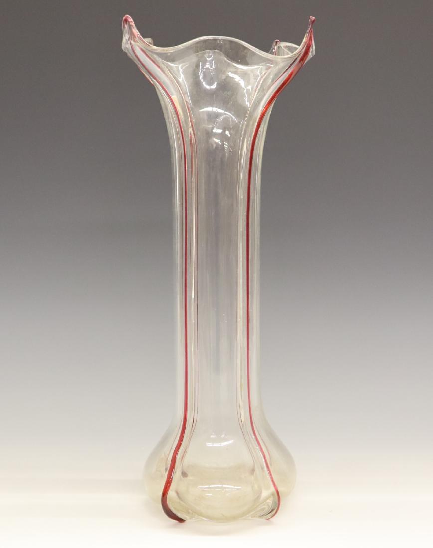 Art Glass Vase: An Early 20th Century Art Glass Vase. Having a handkerchief style rim with applied red accents. Unmarked; polished pontil. Some scratches evident at the underside. 16 1/4" high. ESTIMATE $100-150