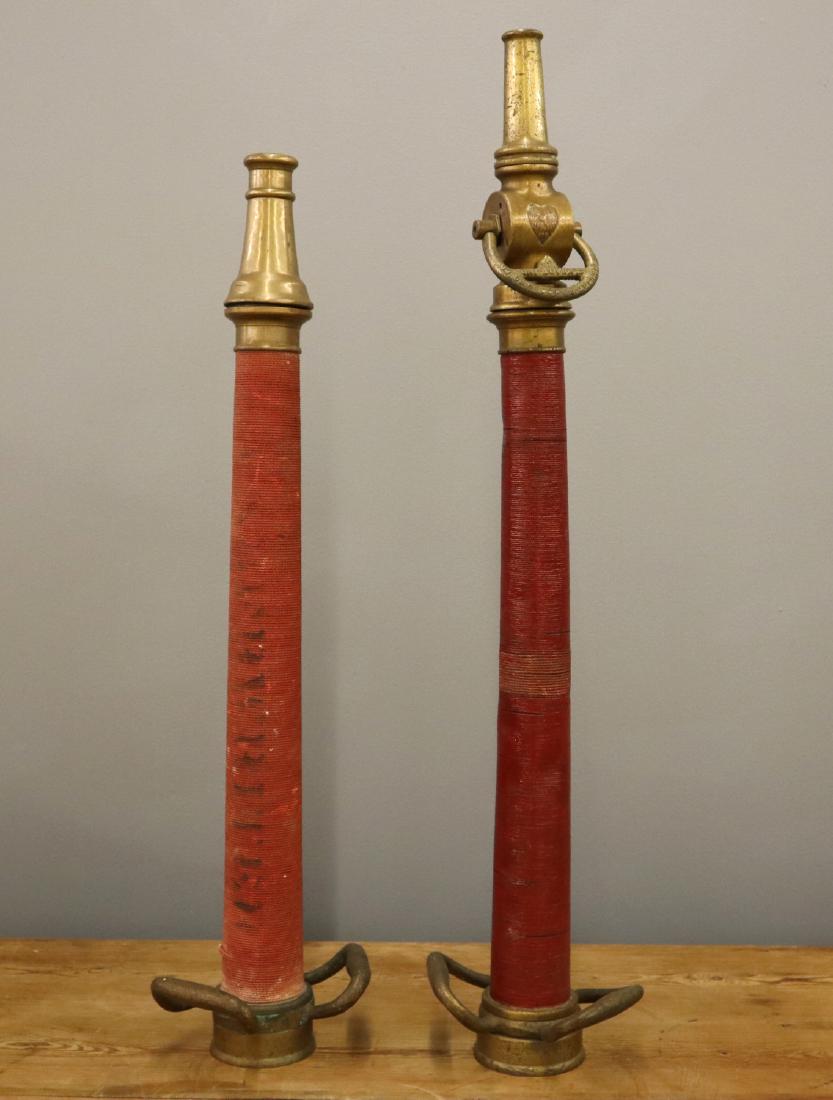 2 Fire Nozzles: Two early 20th century Fire Nozzles. By W.D. Allen Mfg. Co, Chicago, and Elkhart Brass Mfg. Co. Wear and some denting. Up to 34" long. ESTIMATE $100-200
