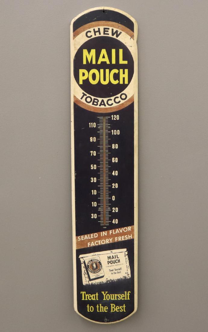 Mail Pouch Chewing Tobacco Wall Thermometer: A 20th century Mail Pouch Chewing Tobacco Wall Thermometer. Lithograph on tin wall thermometer reads "Chew Mail Pouch Tobacco Sealed in Flavor Factory Fresh Treat Yourself to the Best". Surface wear a