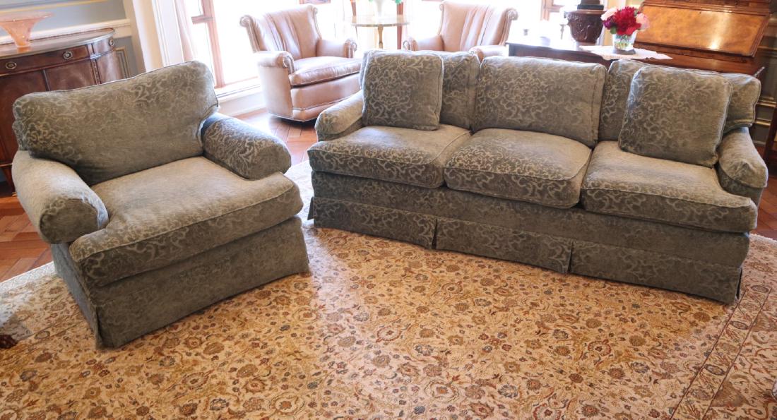 Baker Sofa & Chair: A Baker Upholstered Sofa & Chair. Both pieces are covered with a silvery blue colored upholstery and includes manufacturer's tags. Light wear. Sofa is 65 1/2" long, the oversized chair is 43" wide. ES