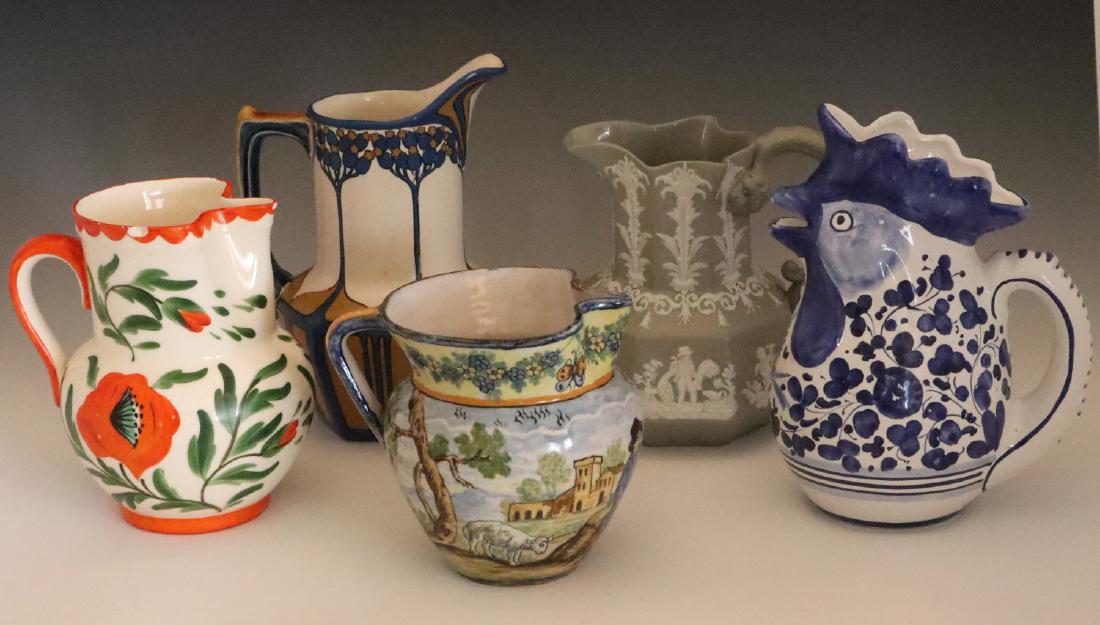 5 Earthenware Pitchers: Five 19th & 20th Century Earthenware Pitchers. Including 1 Samuel Alcock & Co., 1 Erphila Art Pottery, 1 Deruta San Gimignano figural pitcher (Rooster), 1 Mettlach, and 1 unmarked. Wear to each, some 