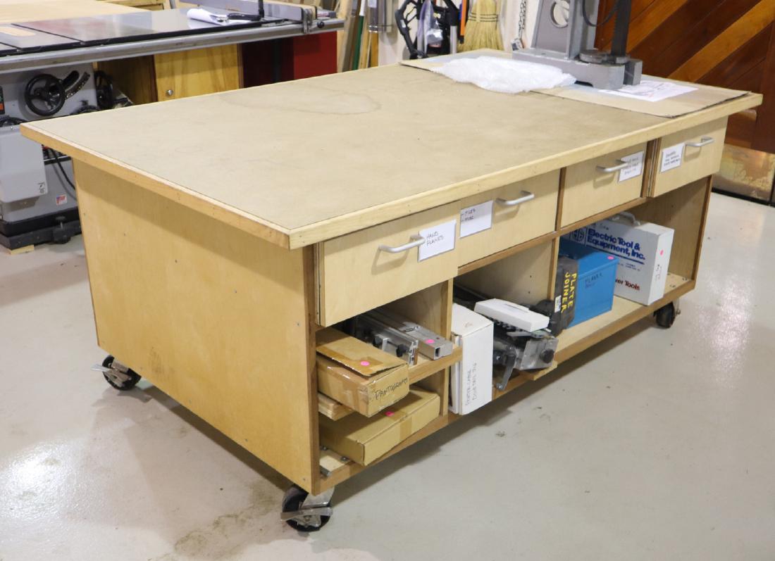 Rolling Work/Storage bench: A Shop made work storage bench with 4 pass-through drawers and lower storage compartments. Minor wear. 80 x 48 x 34 1/2" high. ESTIMATE $200-400