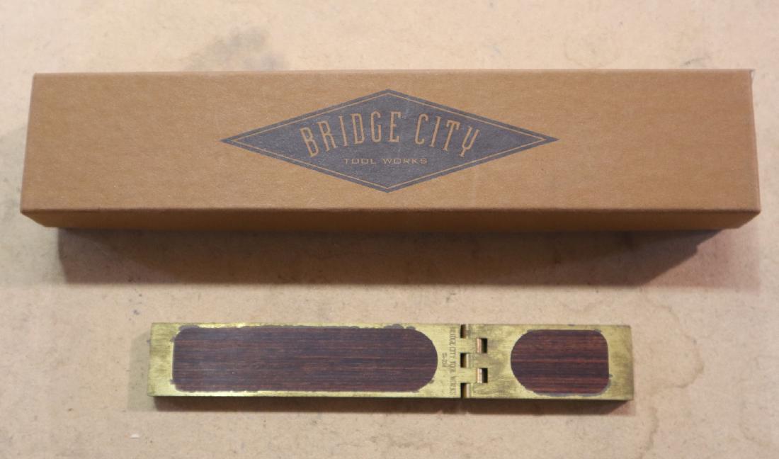 Bridge City Folding Saddle Square: A Bridge City Tool Works SS 2 x 4 folding saddle Square. Includes paperwork and original box. Only slight wear. ESTIMATE $50-100