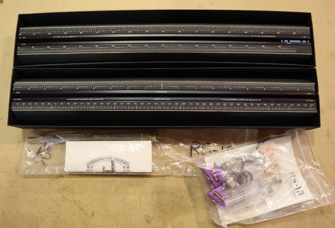 Bridge City Measuring System: A Bridge City Tool Works RS-18 measuring system with two rails and trammel points. Includes paperwork and original box. Only slight wear. ESTIMATE $100-150