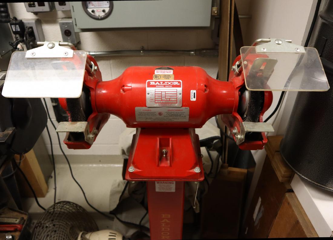 Baldor 3/4 hp Grinder/Buffer: A Baldor 3/4 hp grinder/buffer on stand. Some wear. ESTIMATE $100-200