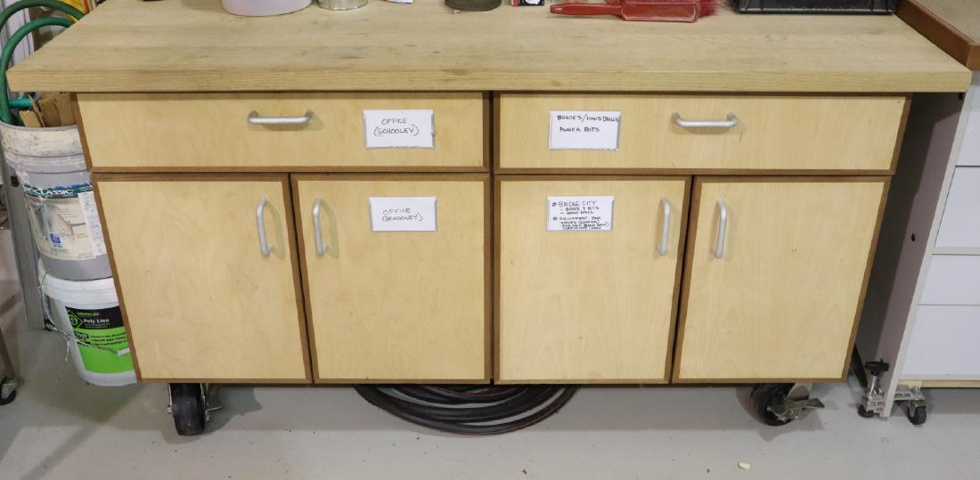 Rolling Work/Storage bench: A Shop made work storage bench with 2 drawers and 4 lower drawers. Minor wear. 86 x 28 x 35" high.