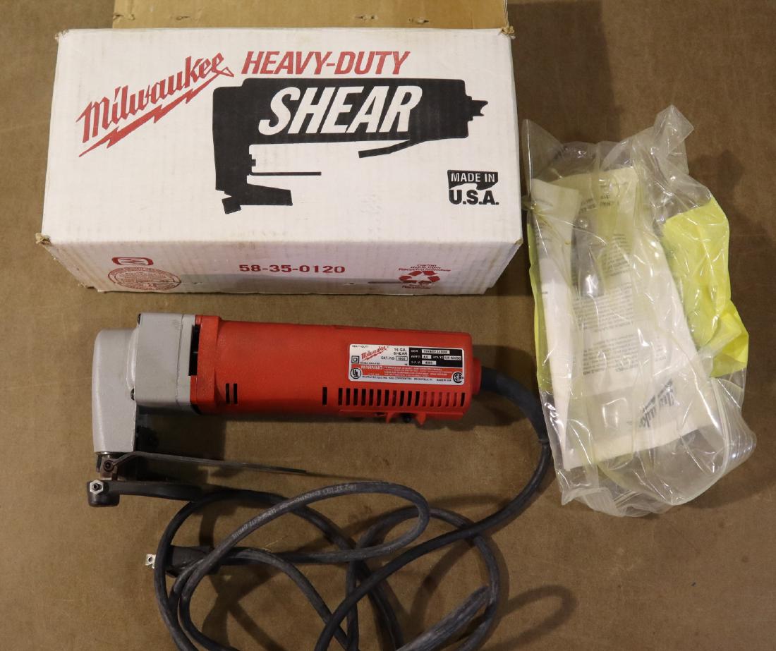 Milwaukee 6805 shear: A Milwaukee model 6805 16 ga hand held shear with box and instructions. Minor wear. ESTIMATE $40-60