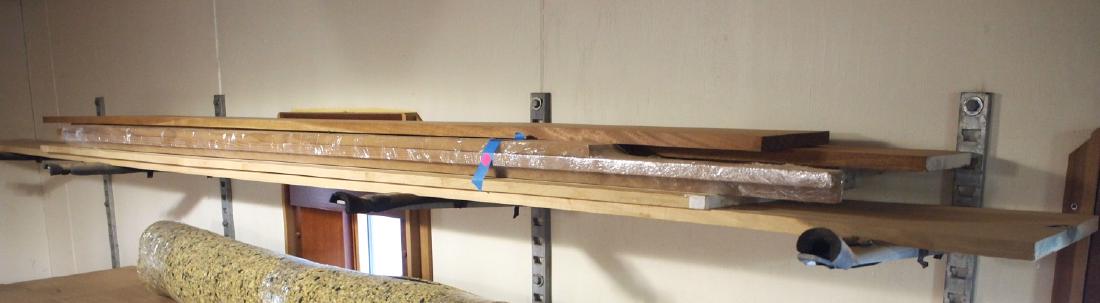 Shelf lot Cabinet wood: Approximately eight pieces of cabinet wood. Includes Mahogany, Poplar etc. various widths and thicknesses up to 12' long, some moldings and shorts. As found condition. ESTIMATE $40-60